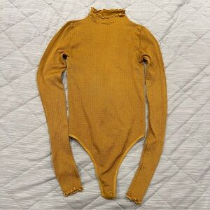 Free People Bodysuit in Gold